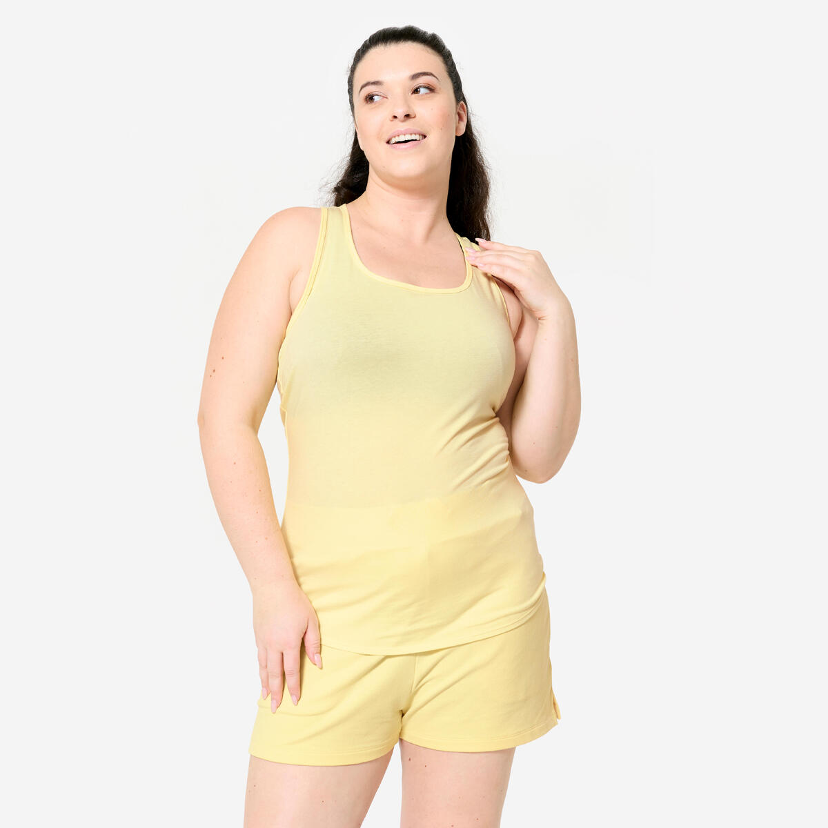 Débardeur slim col rond fitness femme, jaune pastel