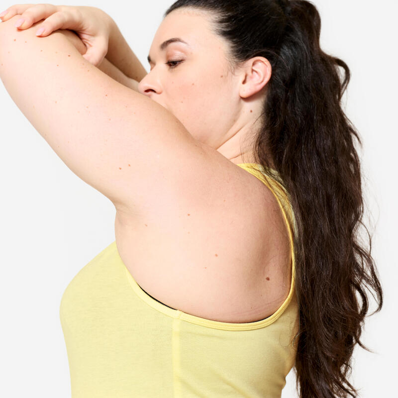 Débardeur slim col rond fitness femme, jaune pastel