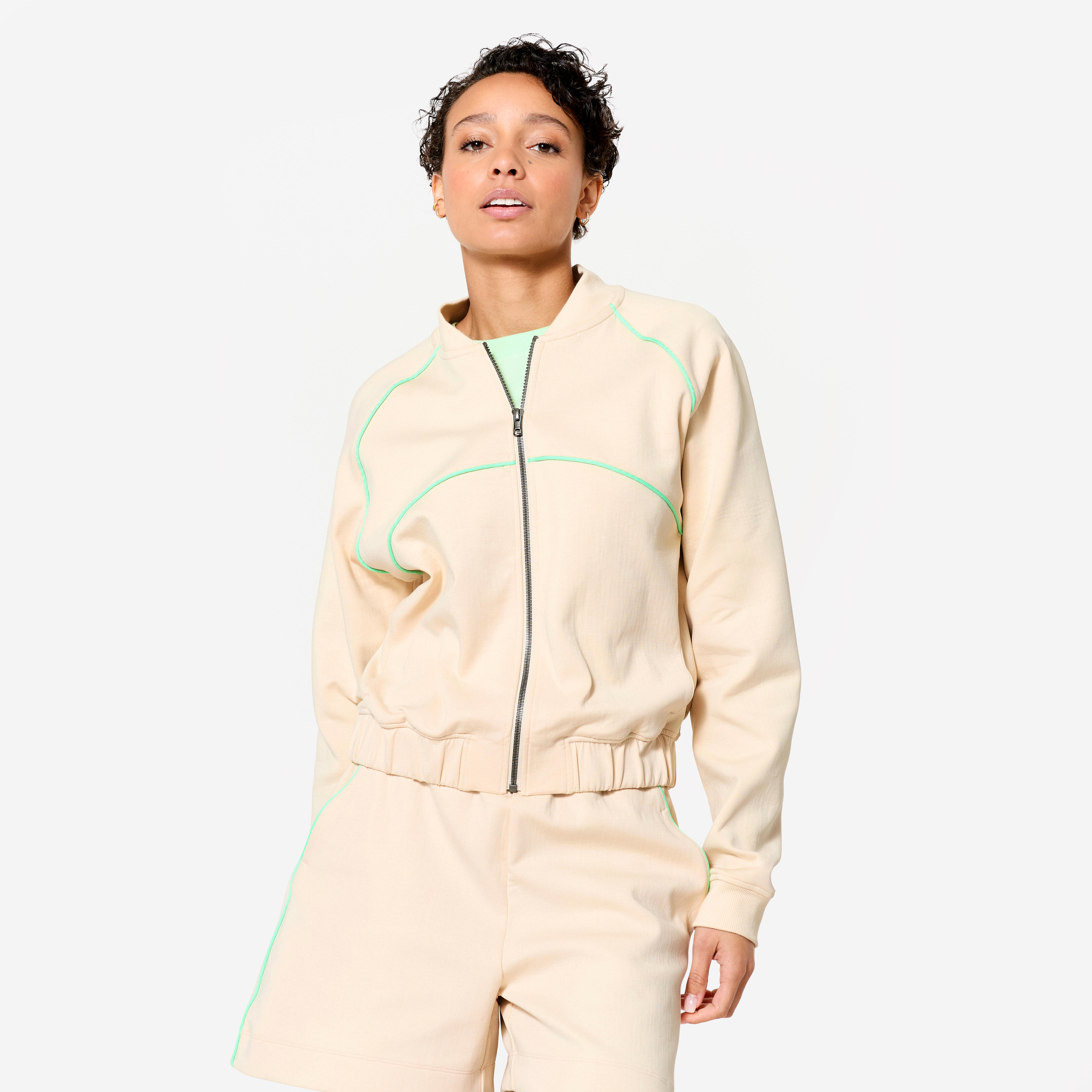 Casaco bomber com fecho fitness mulher bege com debrum verde