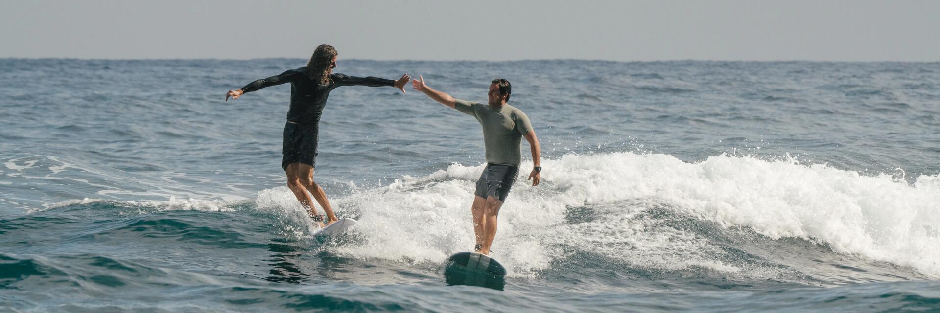 Two men surfing