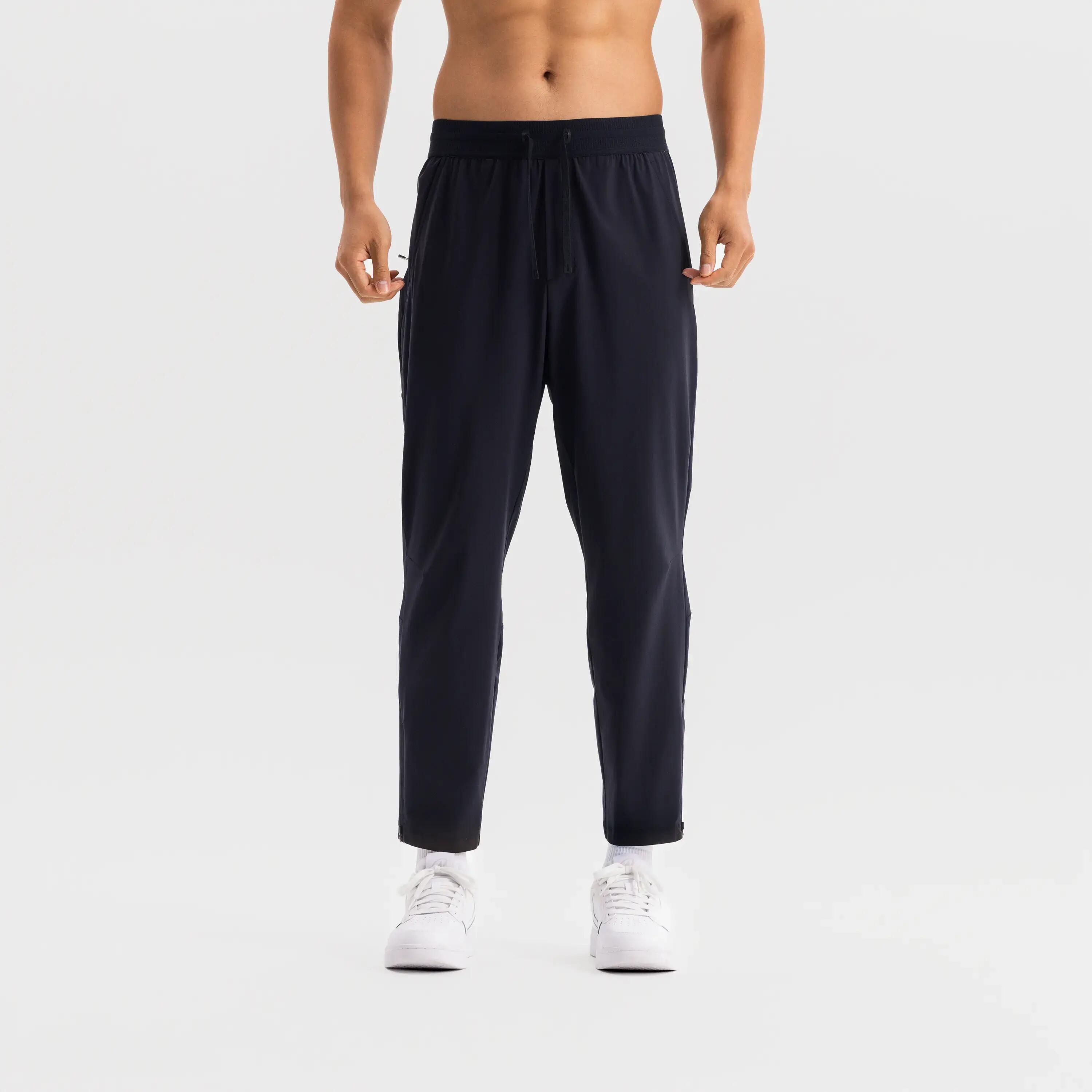 Training MEN STRETCHY, COOLING AND ANTI-UV PANTS, smoked black -  1