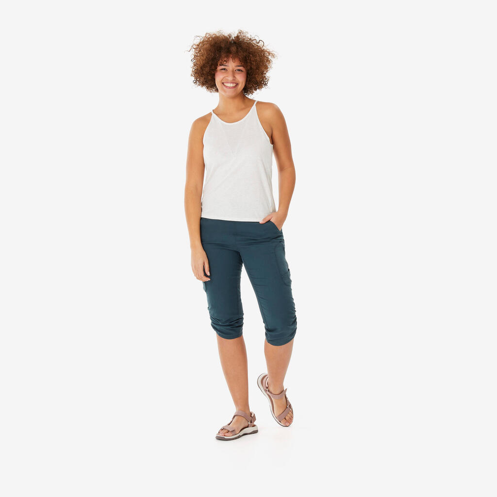 ŽENSKE KAPRI PANTALONE ZA PLANINARENJE NH500 - ZELENE