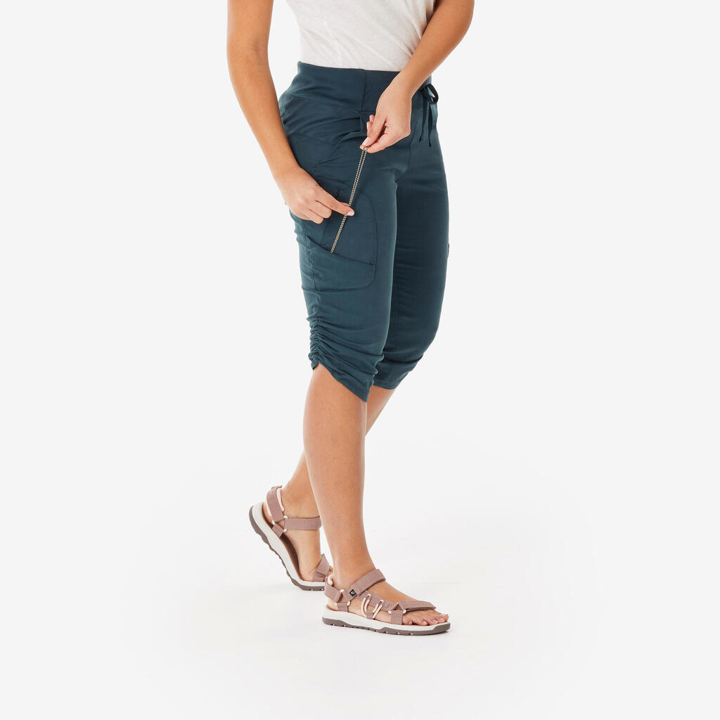 ŽENSKE KAPRI PANTALONE ZA PLANINARENJE NH500 - ZELENE