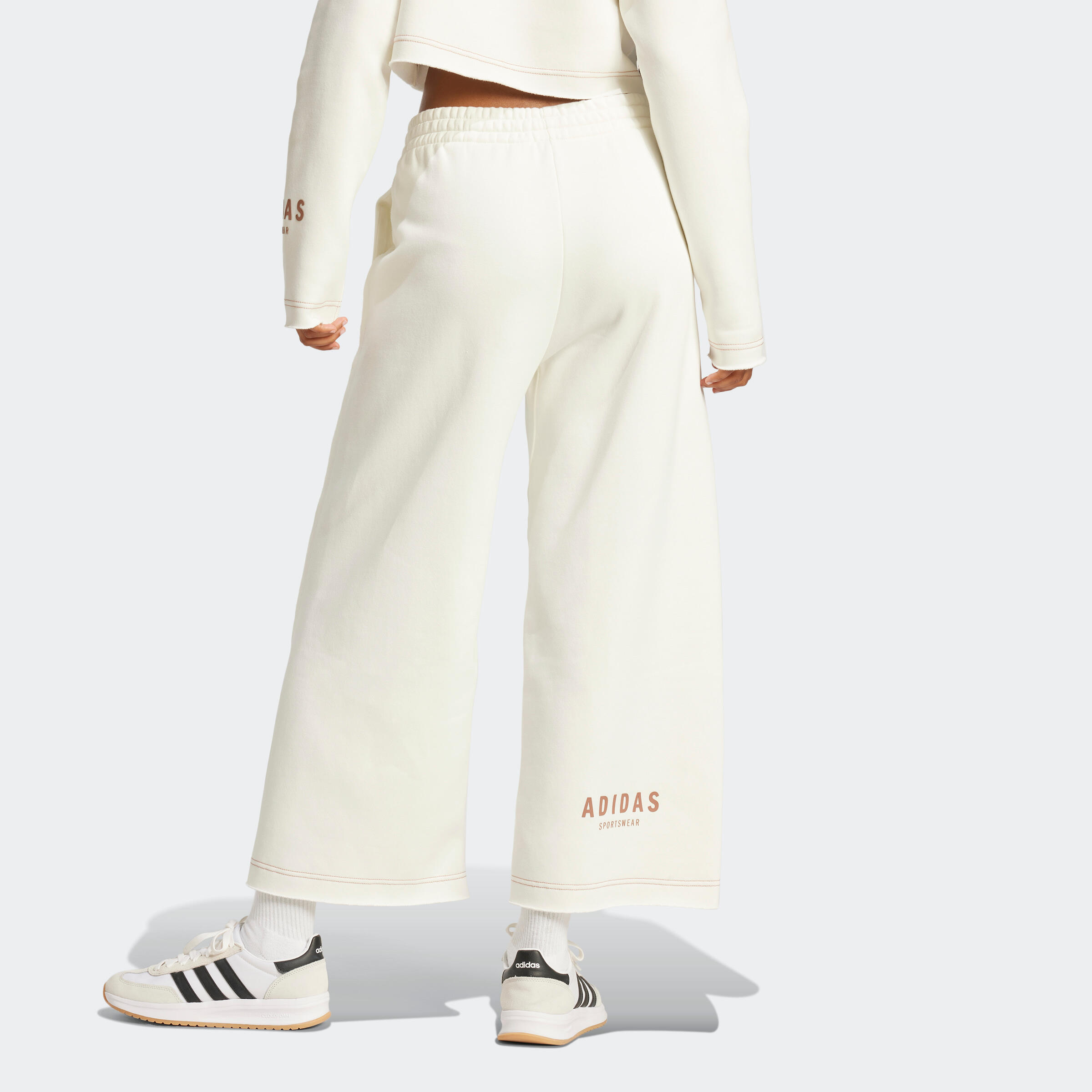 Pantaloni tuta ADIDAS donna flare con tasca bianchi 4/6