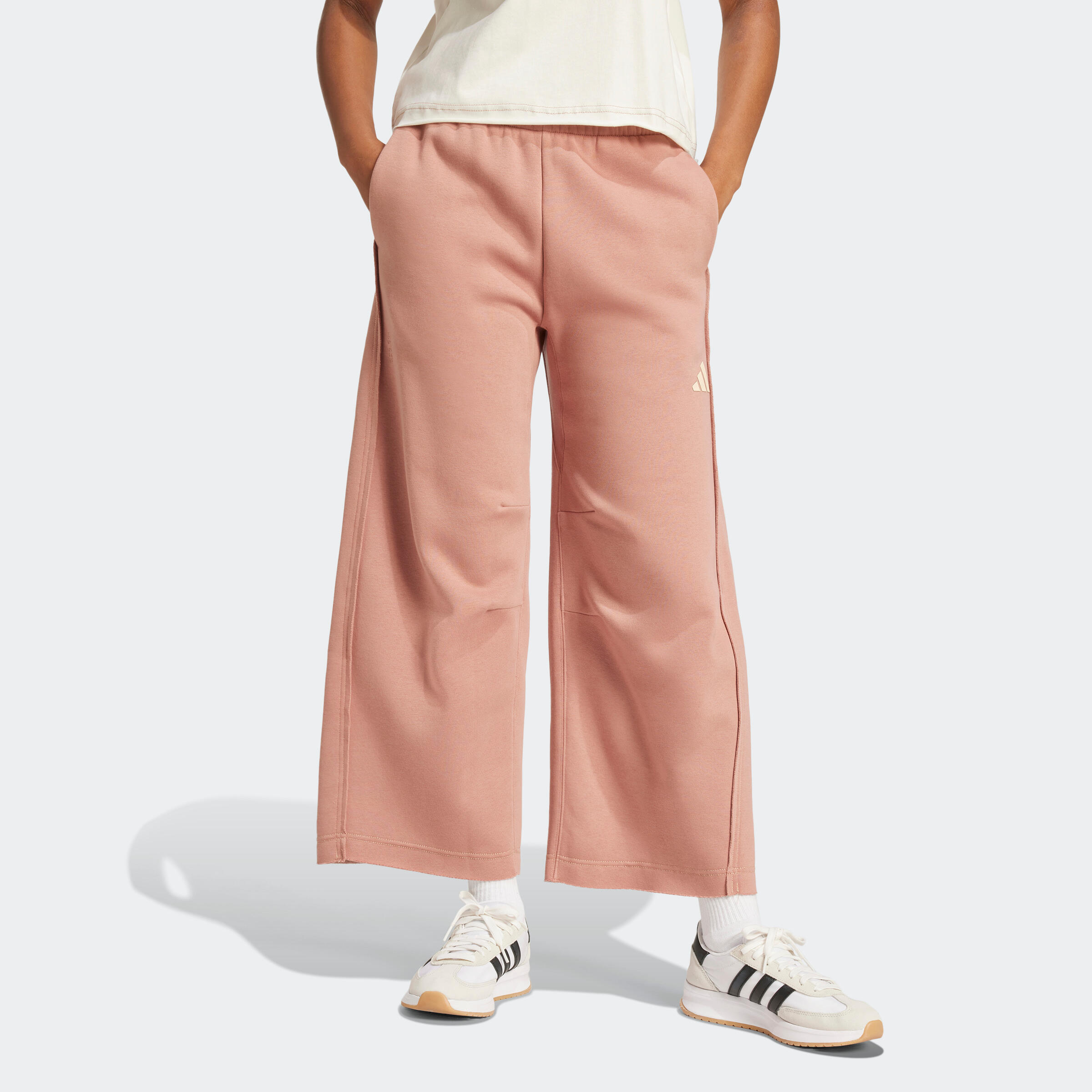 ADIDAS Pantaloni tuta ADIDAS donna flare con tasca rosa