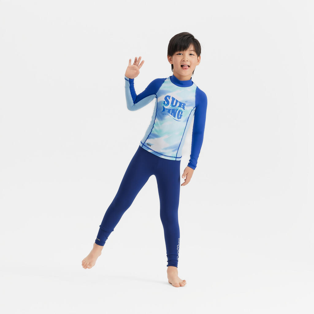 Boy surfing  uv tee shirt 500 long sleeve WAVE