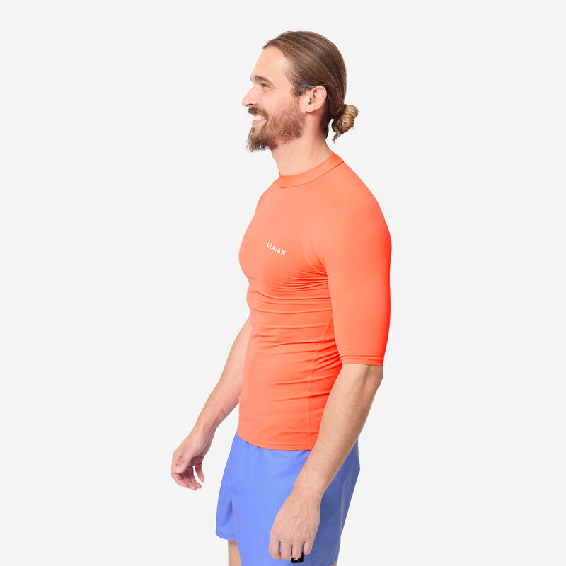 Uv-werende rashguard met korte mouwen voor heren 100 fluo-oranje
