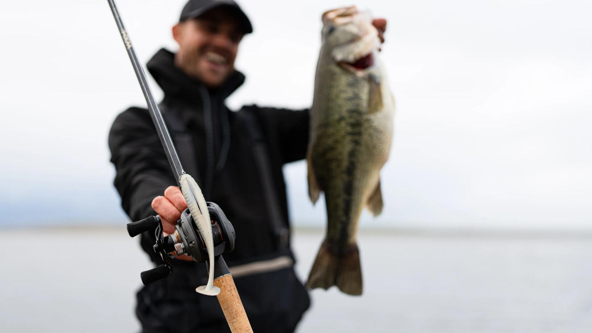 concentrated woman who fishes in the evening