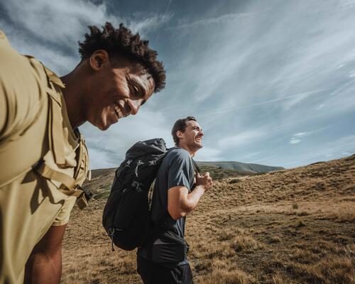 man hiking in the sun