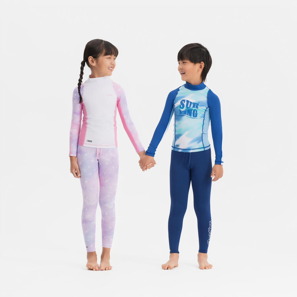 Boy surfing  uv tee shirt 500 long sleeve WAVE