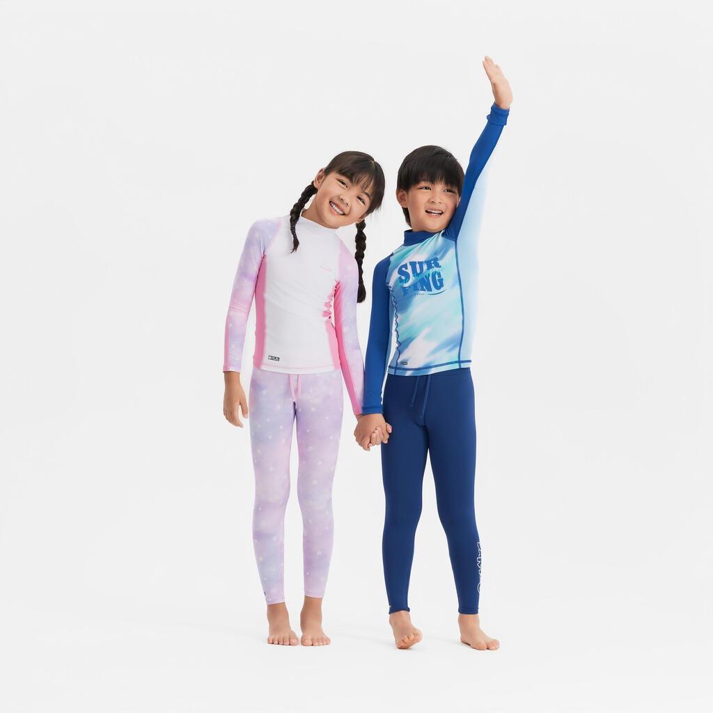 Boy surfing  uv tee shirt 500 long sleeve WAVE