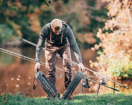 a man throwing his fishing line into the water