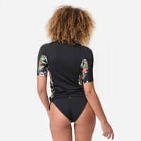 Women's UV-protective short sleeve T-shirt surf top 500 black and floral PARROT