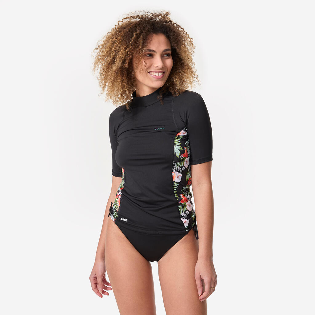 Women’s UV-protective short sleeve t-shirt surf top 500 black and floral PARROT