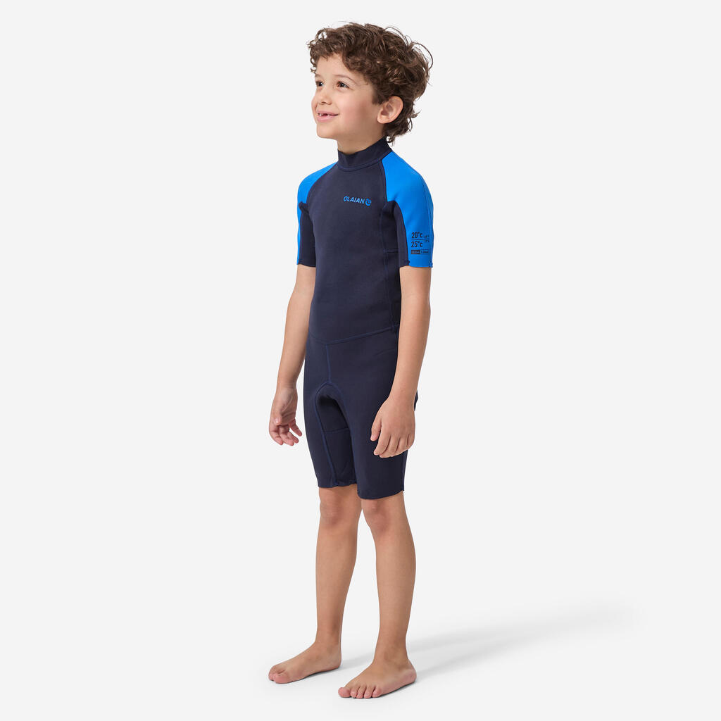 TRAJE SHORTY SURF NIÑOS 100 VIOLETA ROSADO NEOPRENO 1,5 MM