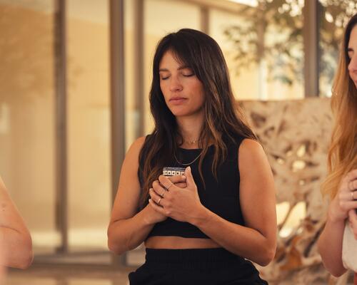 Woman meditating outside