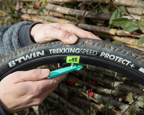 person changing a bike inner tube