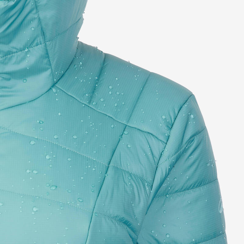 Doudoune de trek à capuche synthétique femme, MT100 bleu