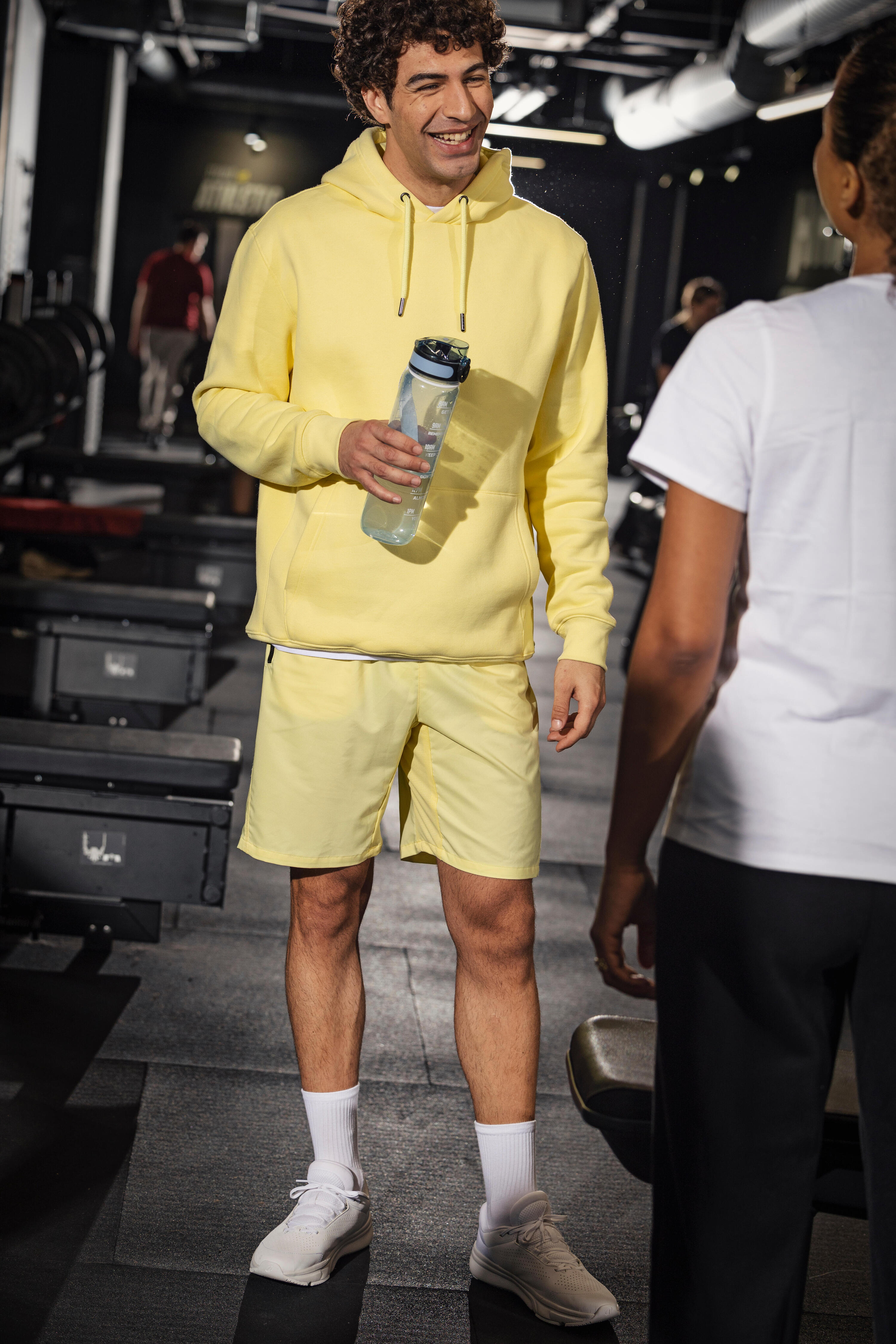 Short de sport respirant avec poches zippées homme 8/9