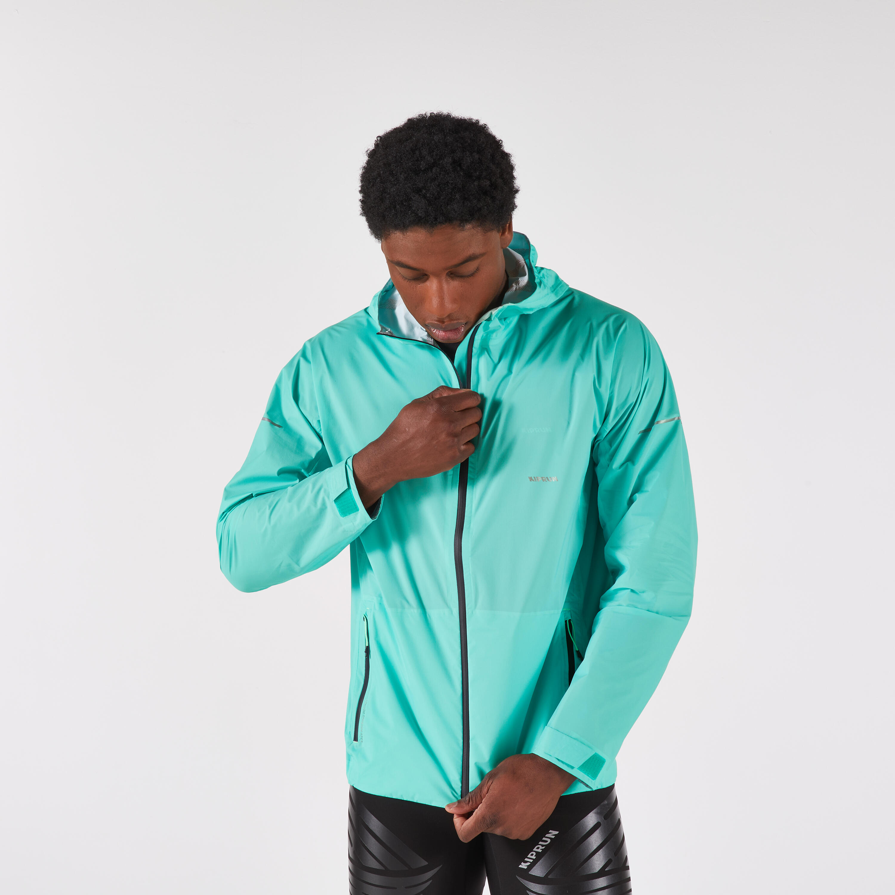 KIPRUN Jaqueta de running impermeable i transpirable home  KIPRUN Run 900 verd llac