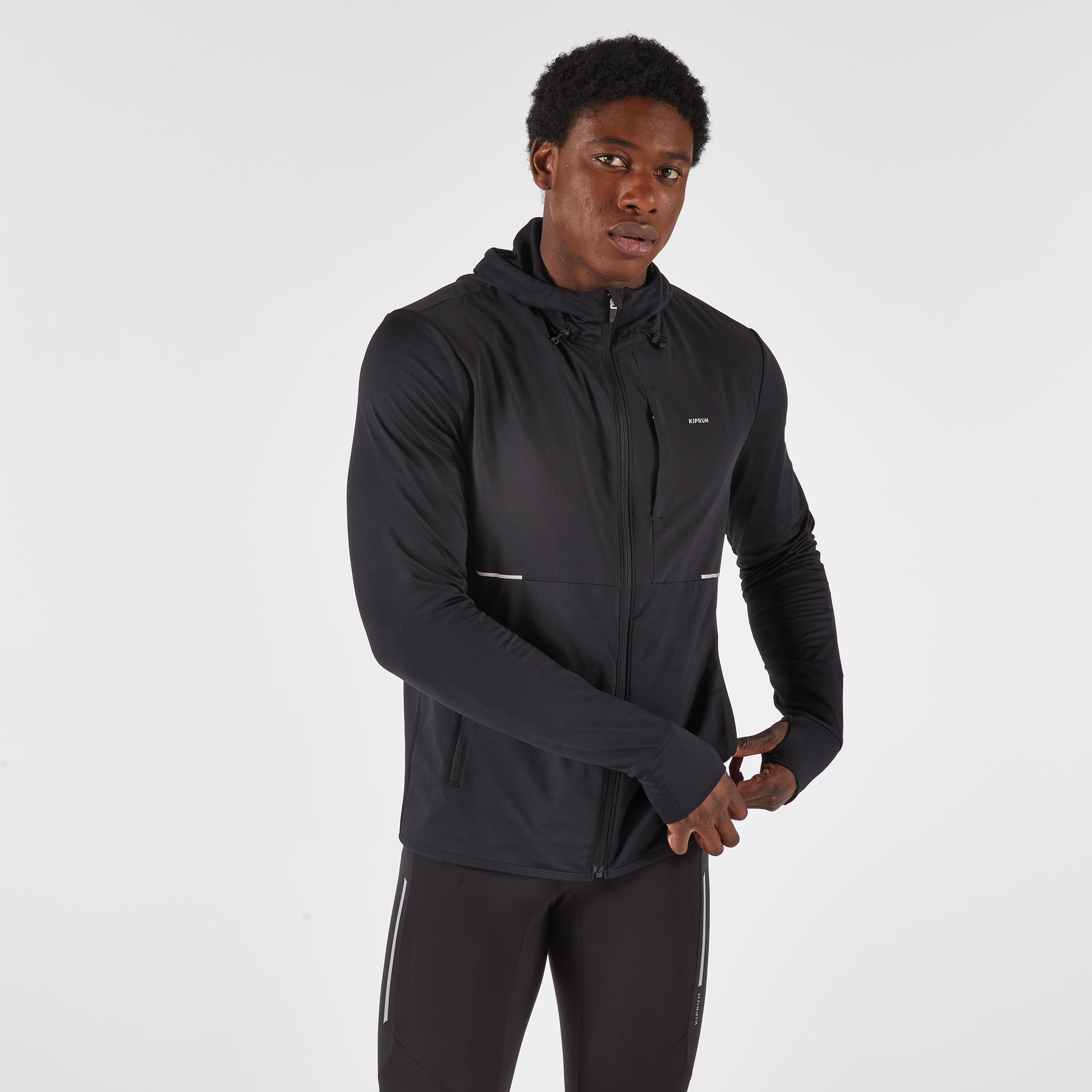 Chamarra de running cálida negra para hombre Kiprun Run 100 Warm 10/14