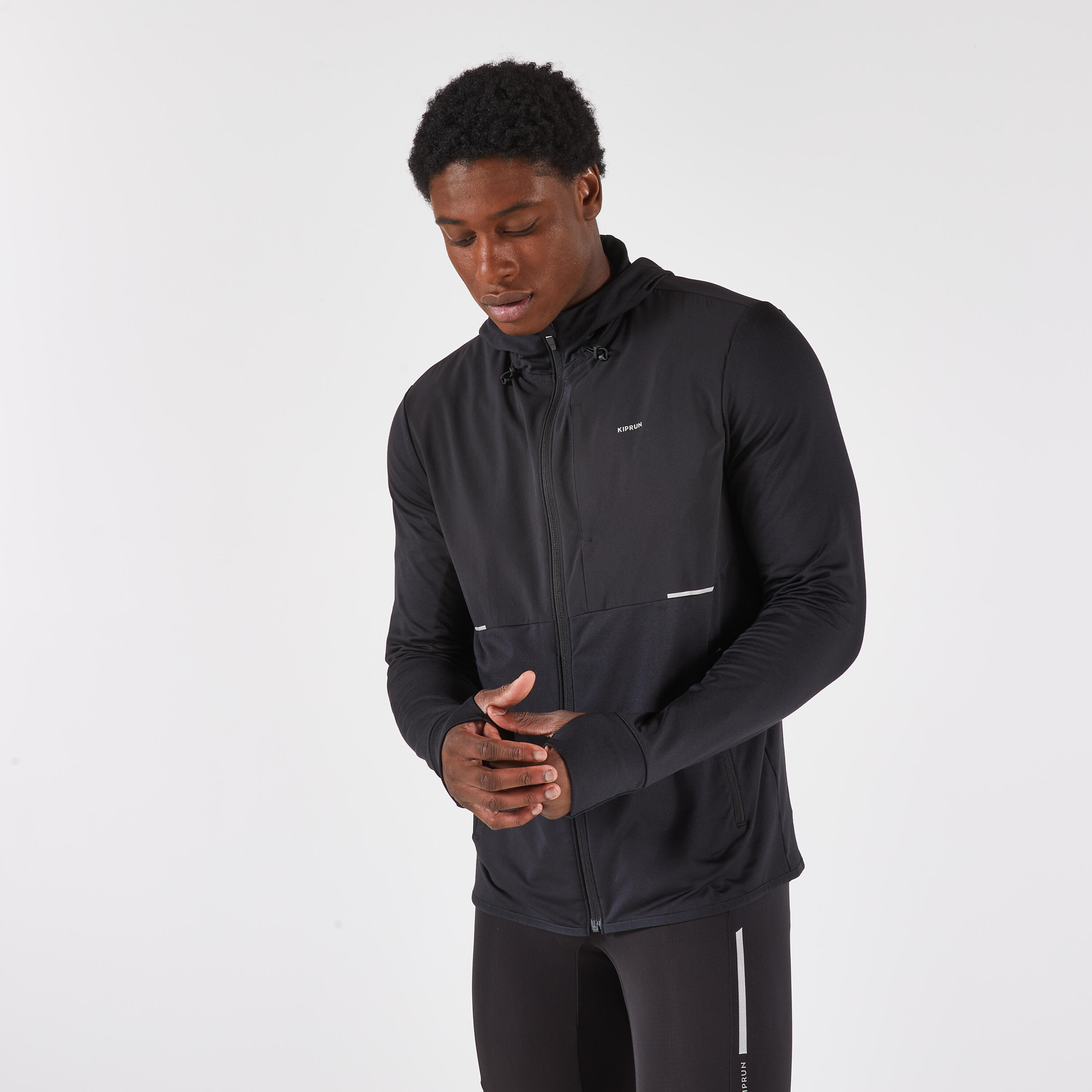 Chamarra de running cálida negra para hombre Kiprun Run 100 Warm 11/14