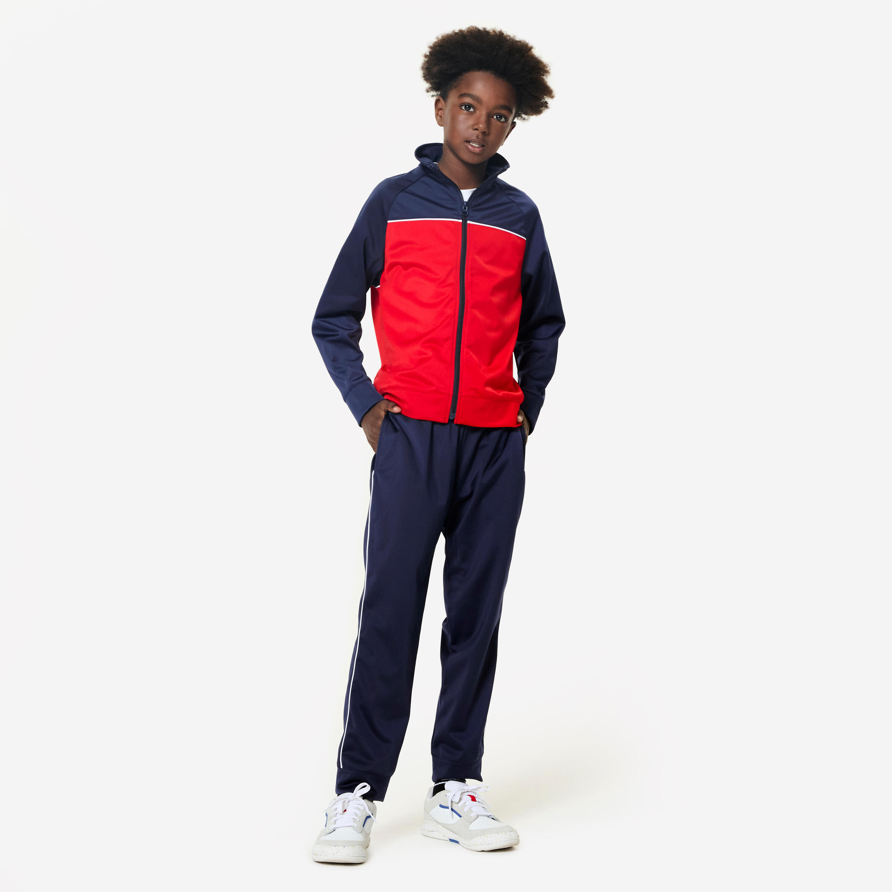 DECATHLON Tweekleurig trainingspak voor kinderen rood/blauw