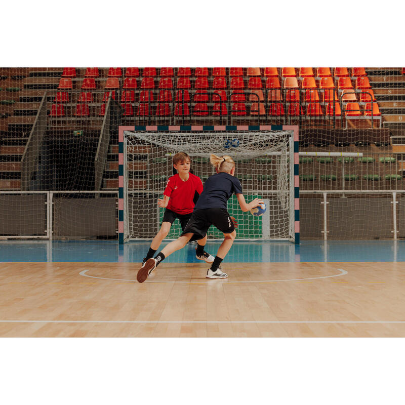 Chaussures de handball Enfant avec lacets - H100 blanc noir