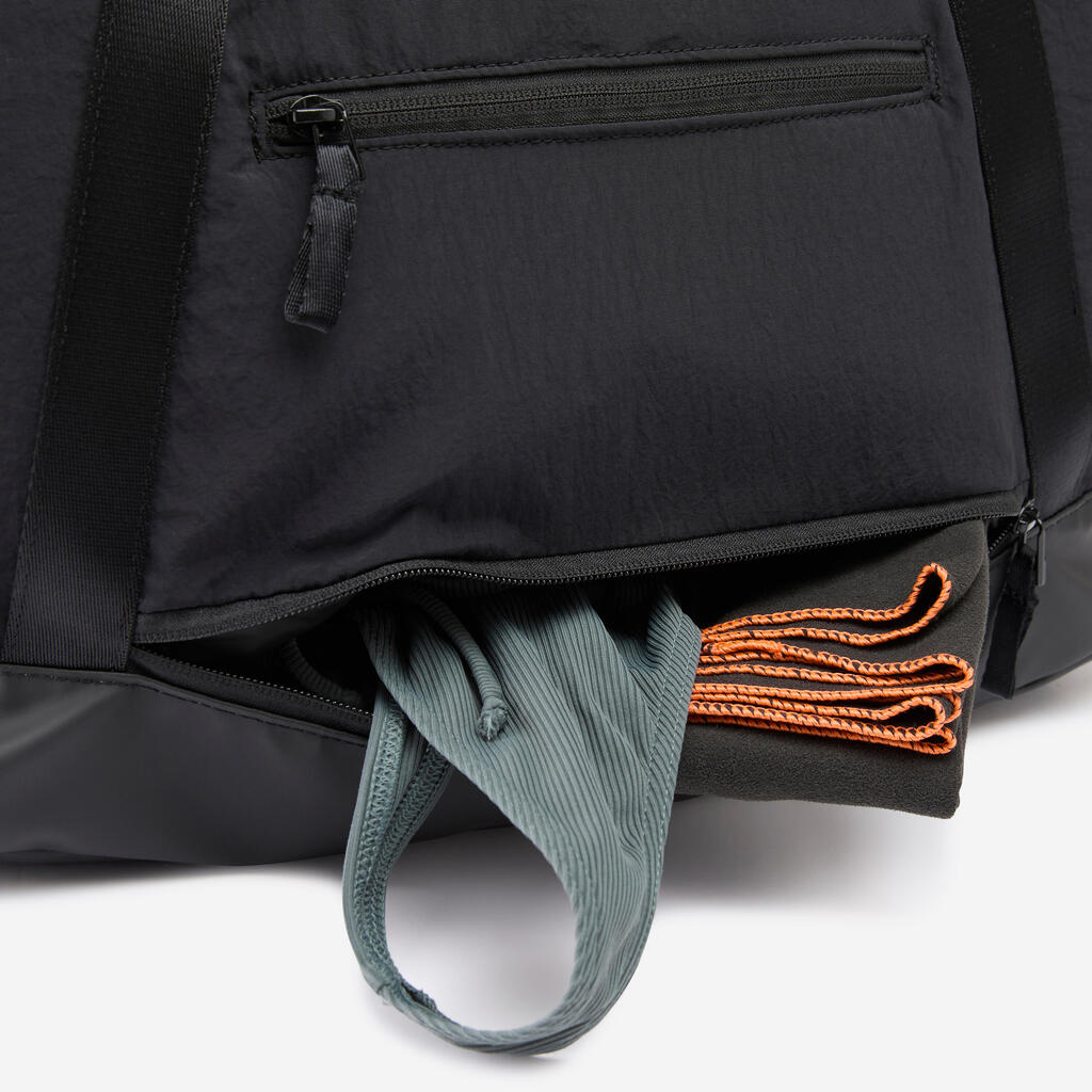 Sport-Umhängetasche mit wasserdichtem Fach 28 l
