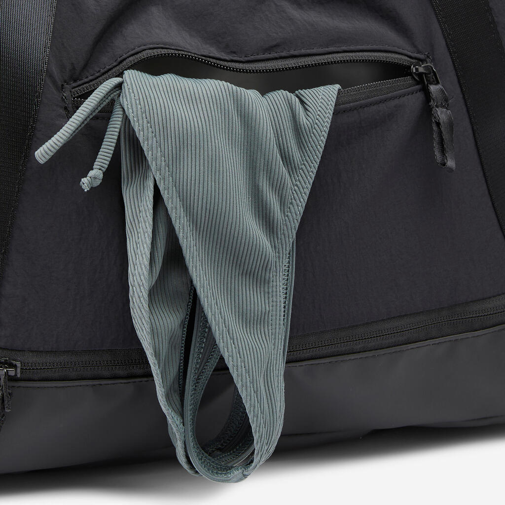 Sport-Umhängetasche mit wasserdichtem Fach 28 l