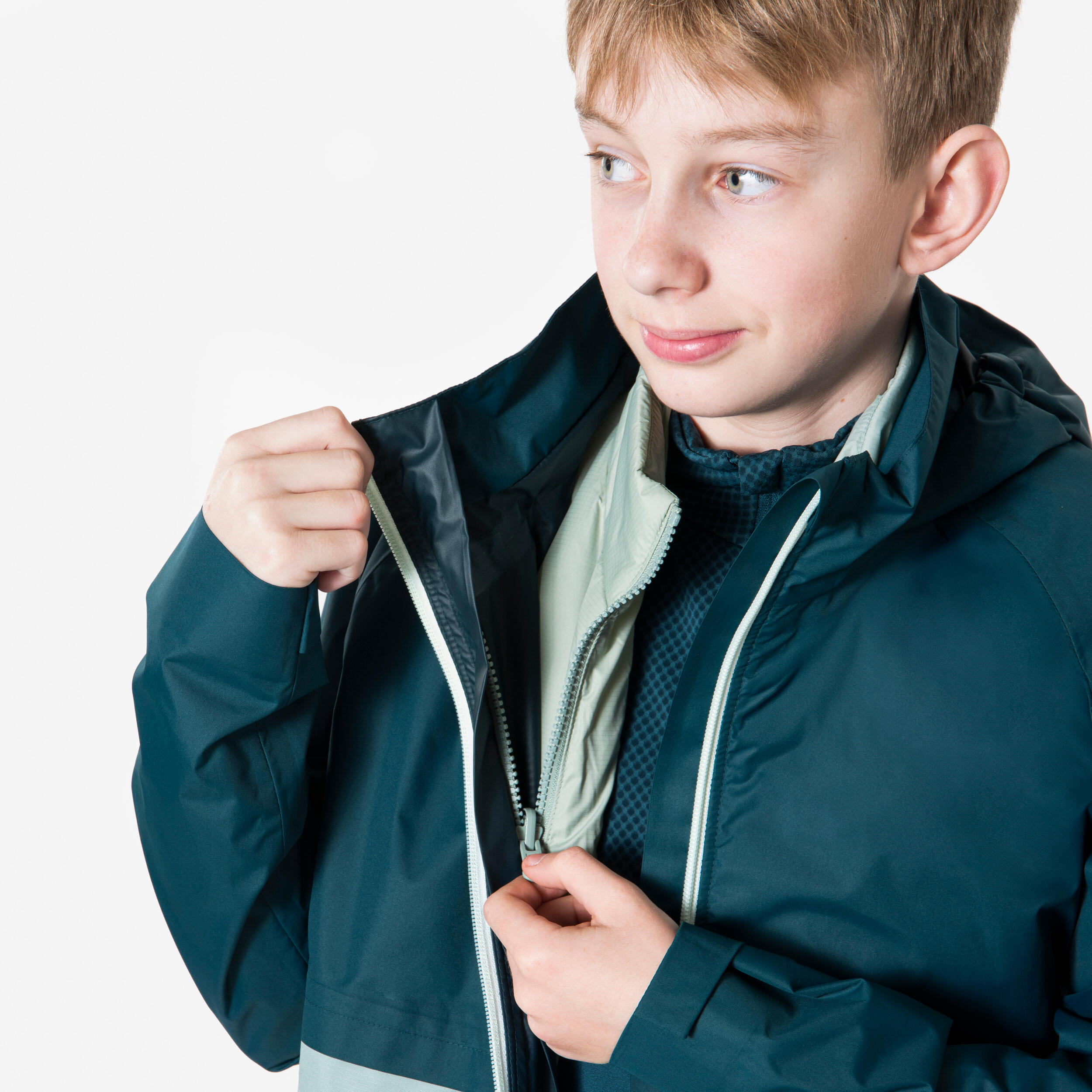 KIPRUN Detská nepremokavá hrejivá bežecká bunda JKT 3v1 modro-zelená 7-8 r (123-130 cm) · záber 7