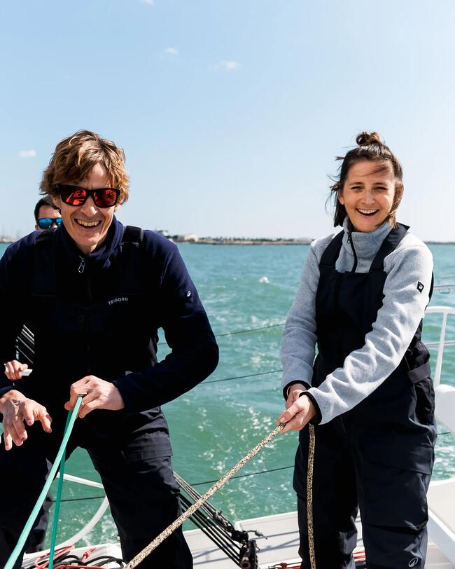 a man and a woman sailing in fleece and dungarees 