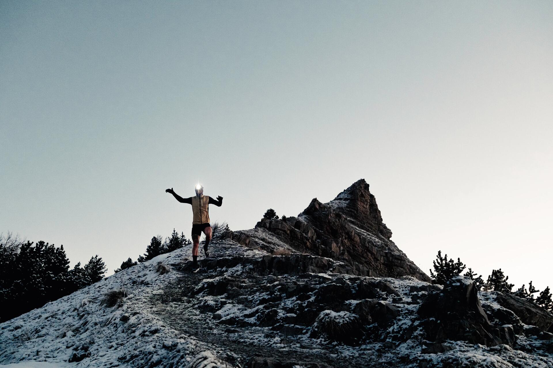 Woman running in multilayers
