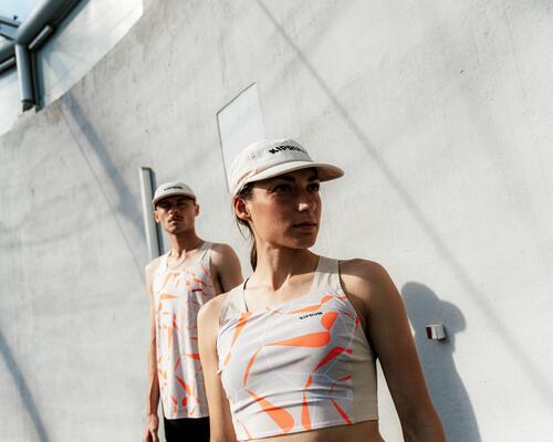 a man and a woman running in hot weather on the mountain
