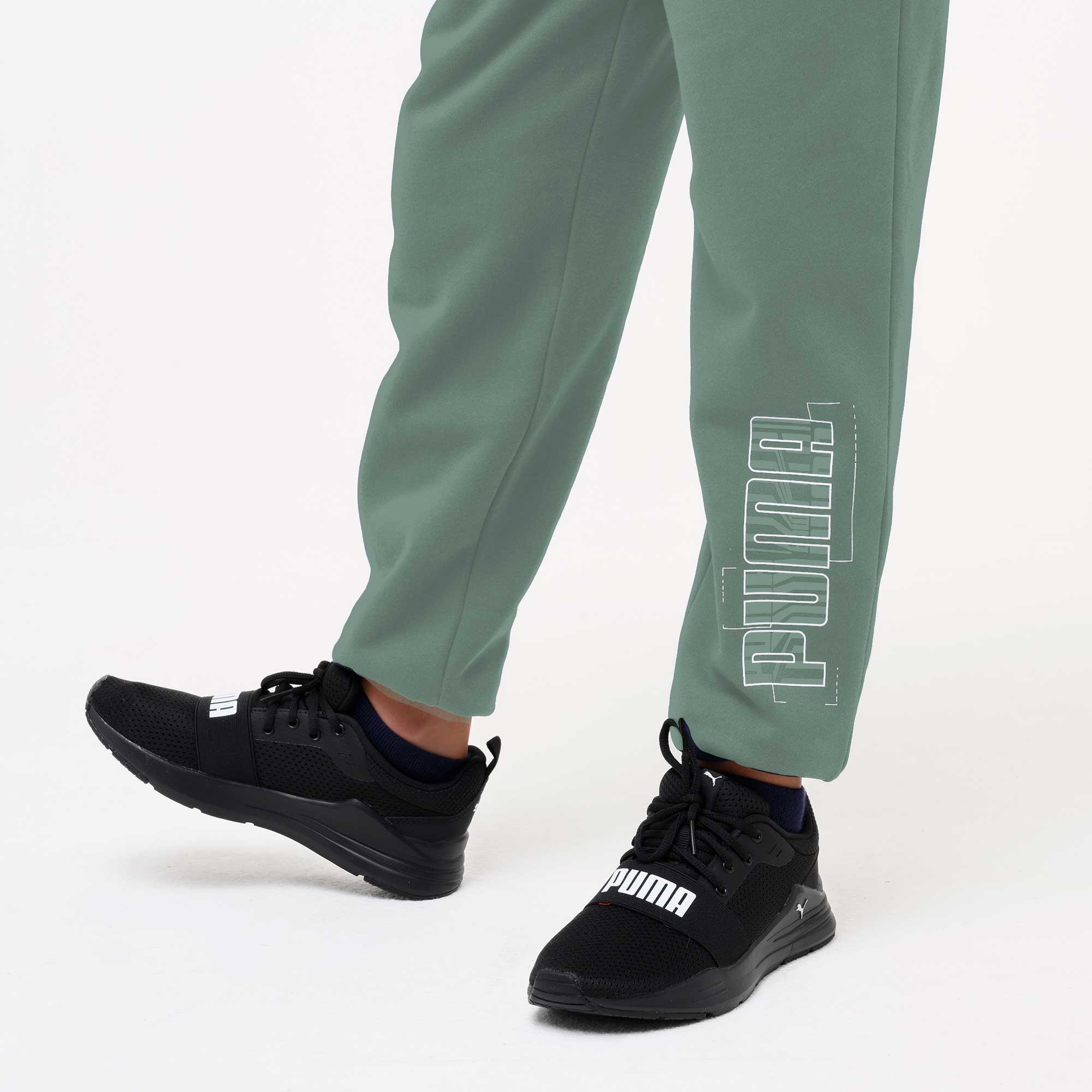 Pantaloni tuta Puma bambino ginnastica regular fit felpati verdi 4/6