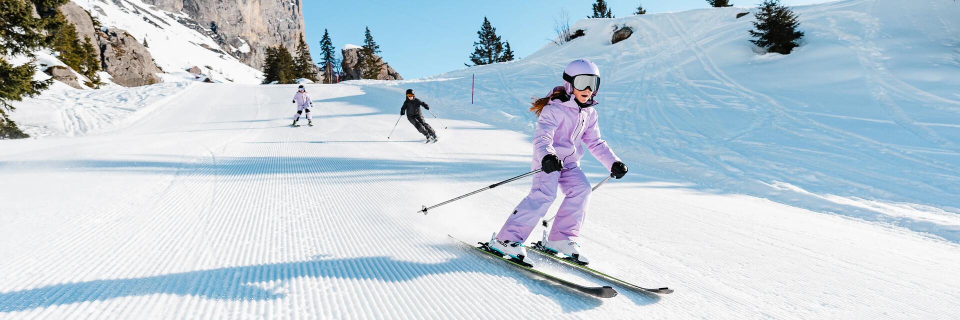 Enfants ski alpin soleil piste de ski