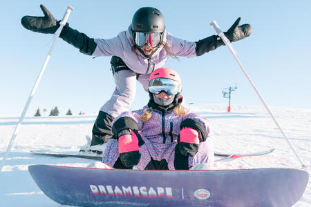 famille en snowboard
