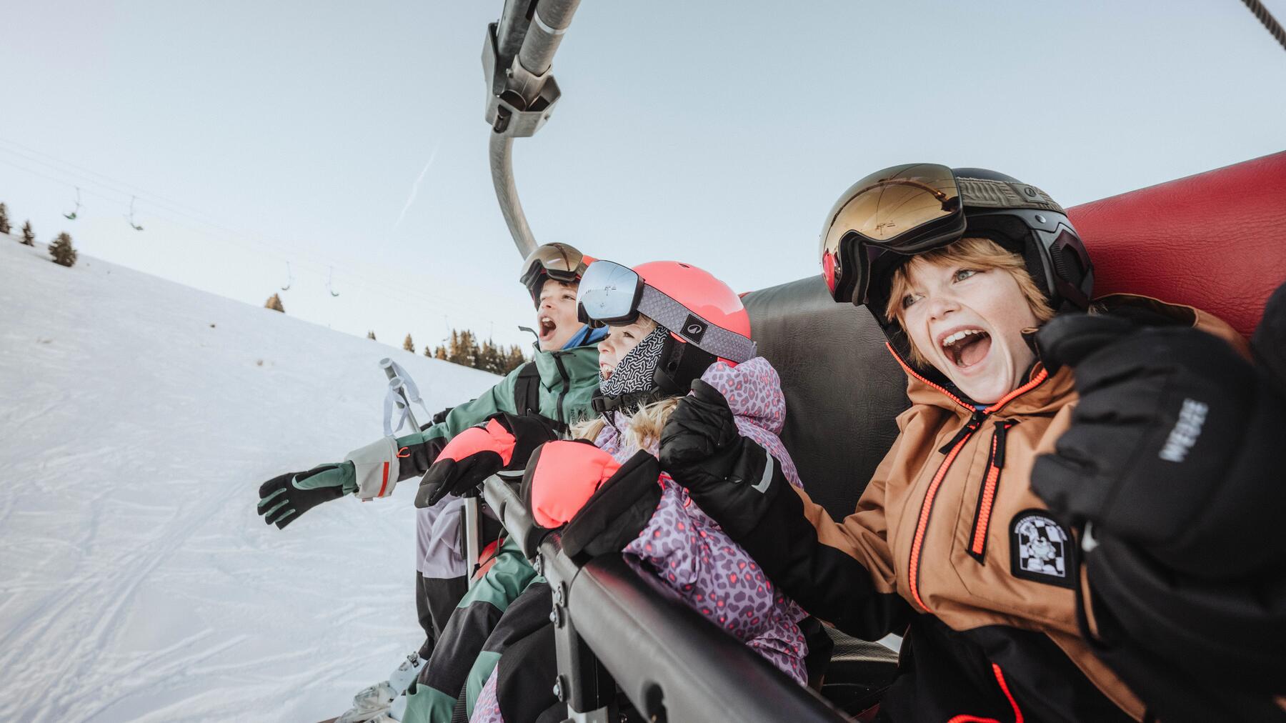 kids on a chair lift