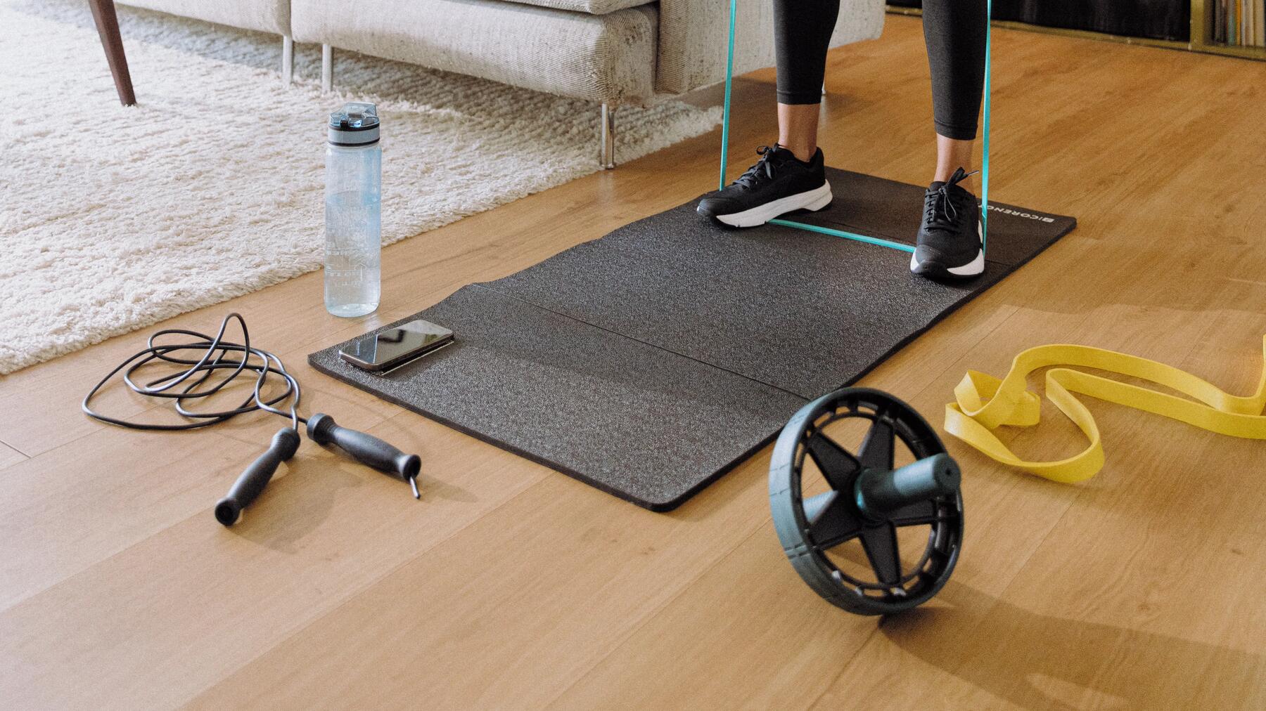 Woman getting ready for training at home