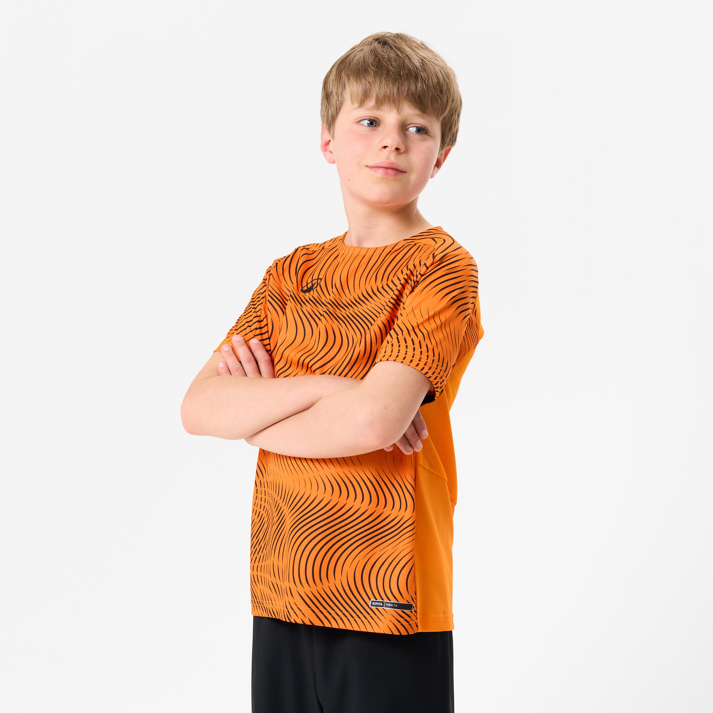 KIPSTA Detský futbalový dres Wavy Club oranžovo-čierny 123-130 cm