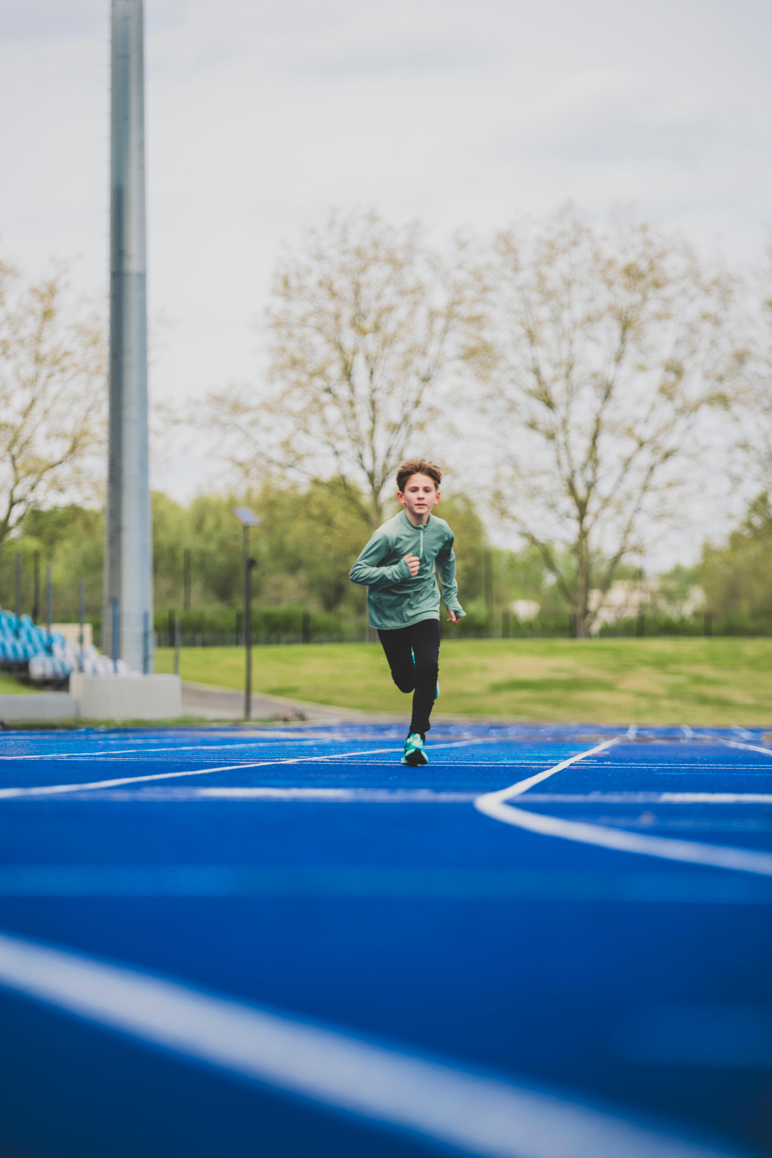Lauftight atmungsaktiv Kiprun Dry Kinder marineblau 10/14