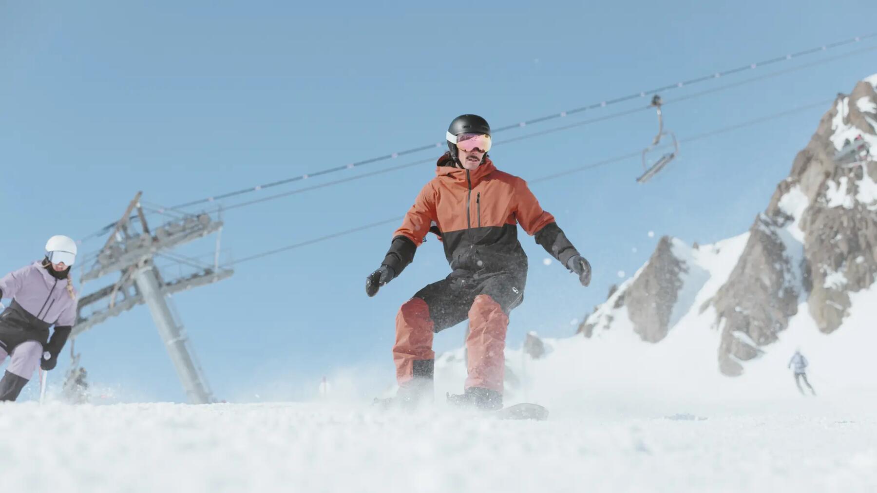 Four friends coming out of the chairlift.