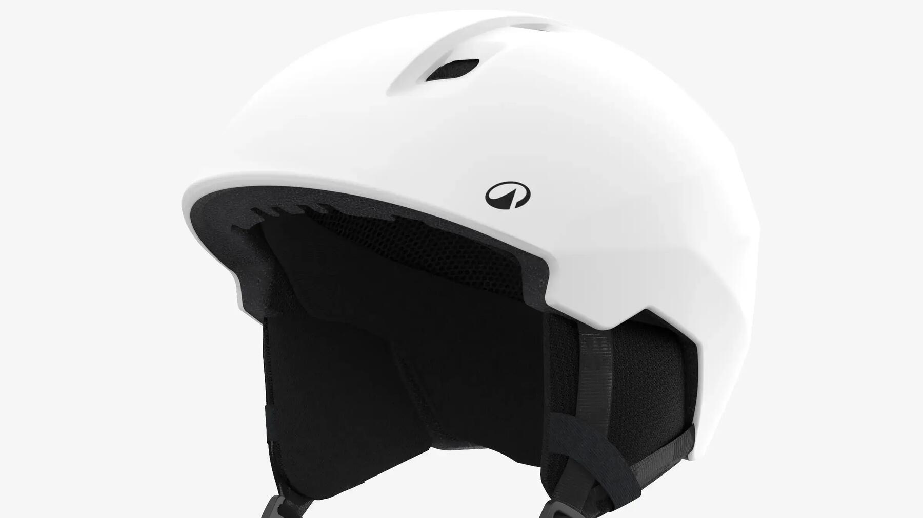 piste skiing goggles and helmet