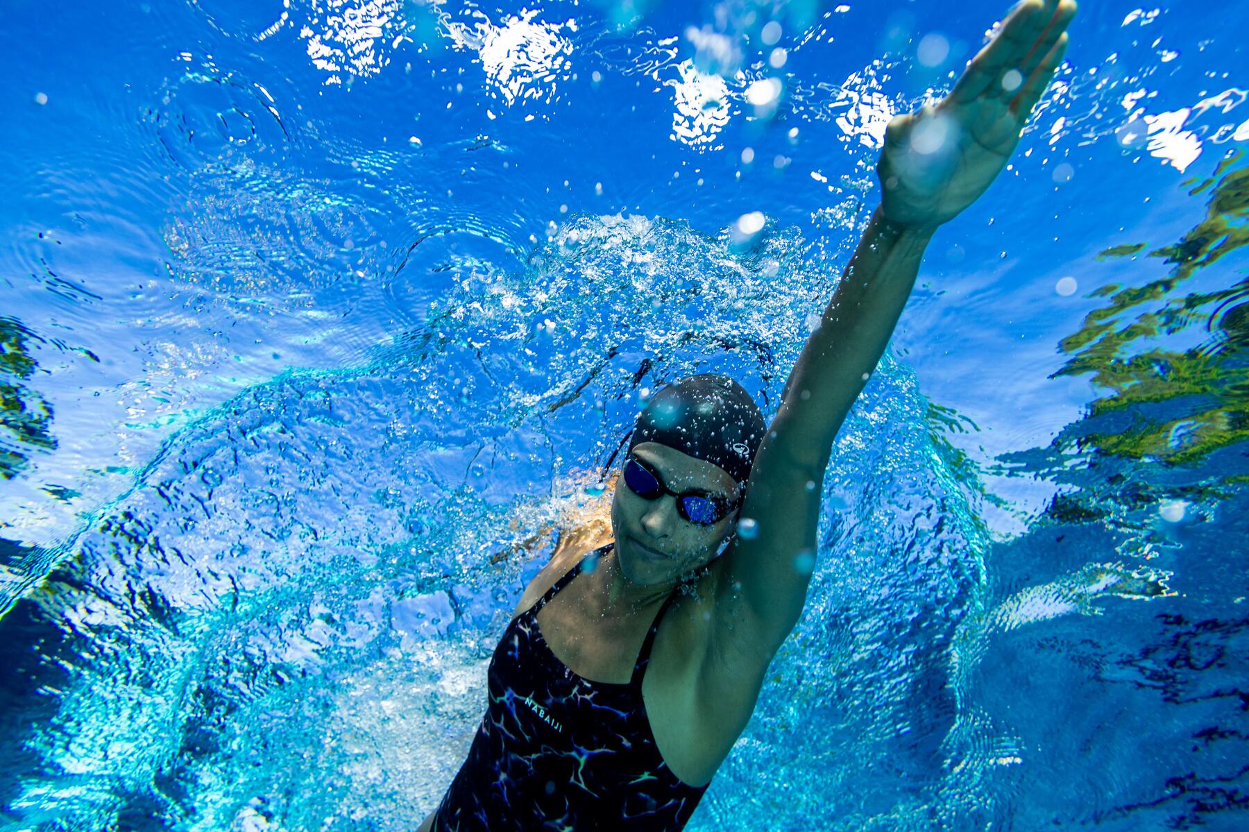 Man swimming under water