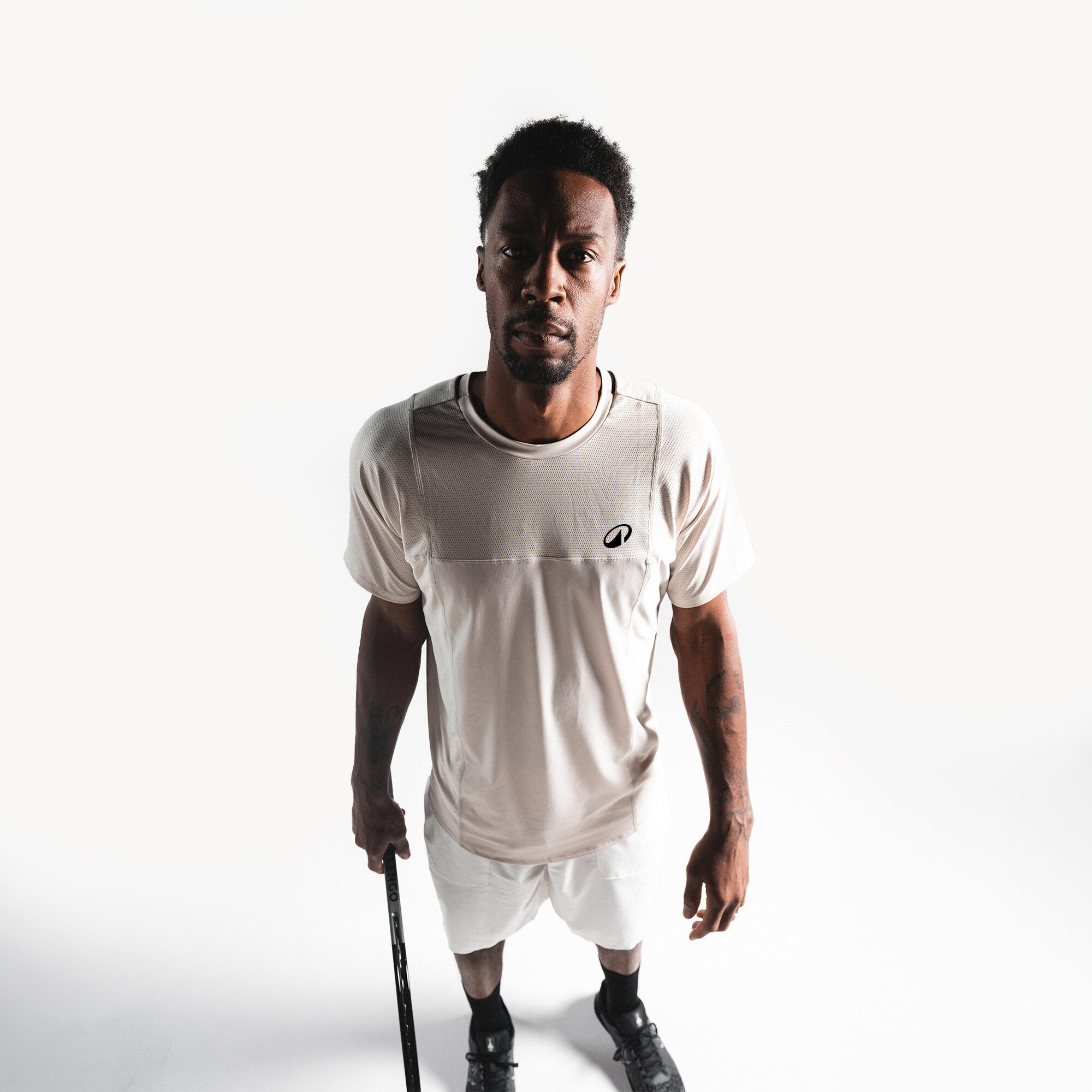 Playera de tenis de manga corta beige para hombre Artengo Dry Gaël Monfils 6/19