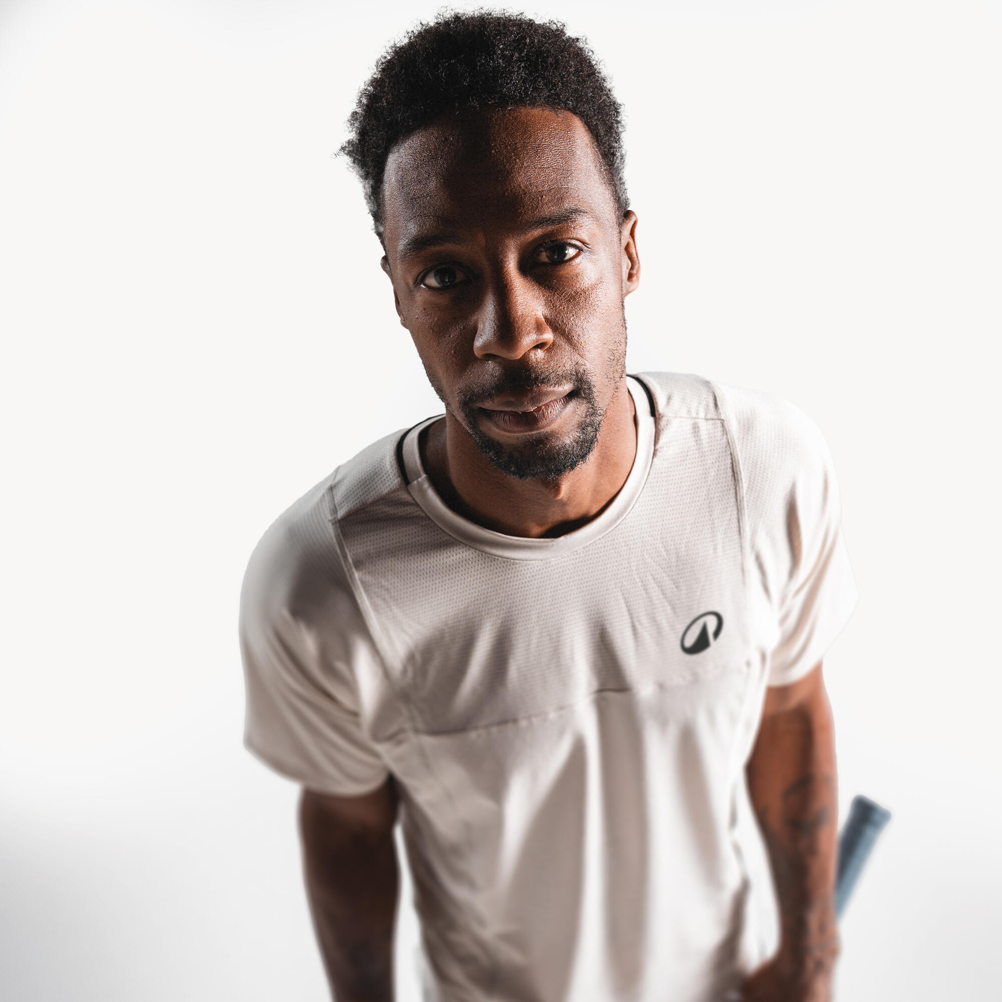 Playera de tenis de manga corta beige para hombre Artengo Dry Gaël Monfils 7/19
