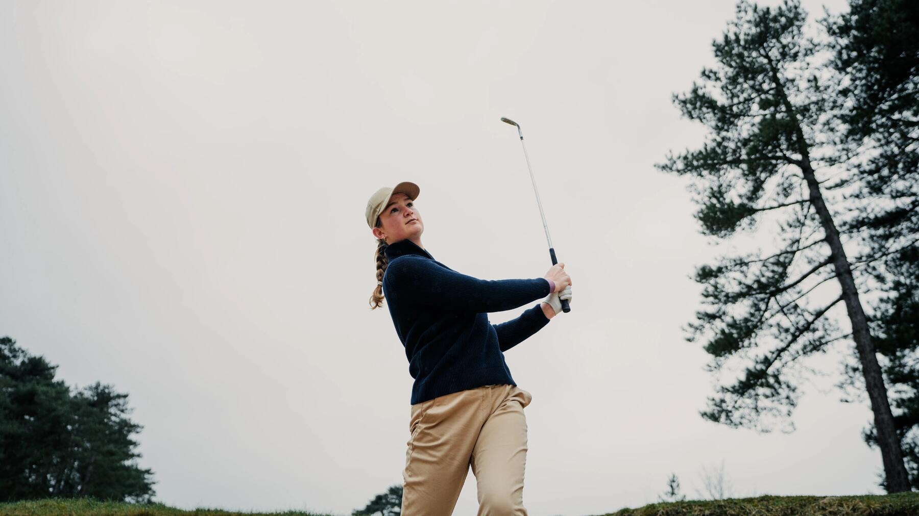 golfers walking side by side on the course