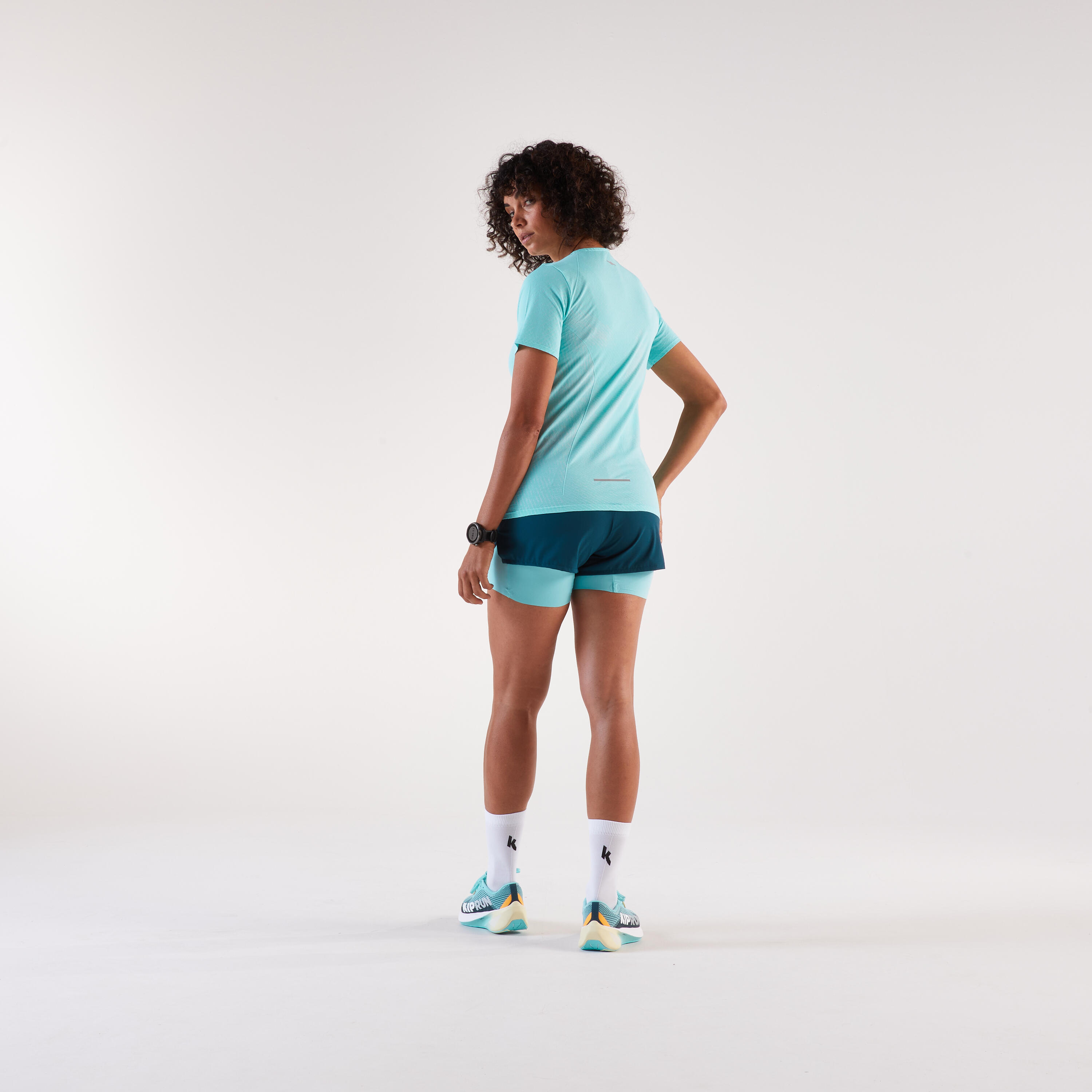 Short de course 2 en 1 femme, Run 500 Confort 10/15