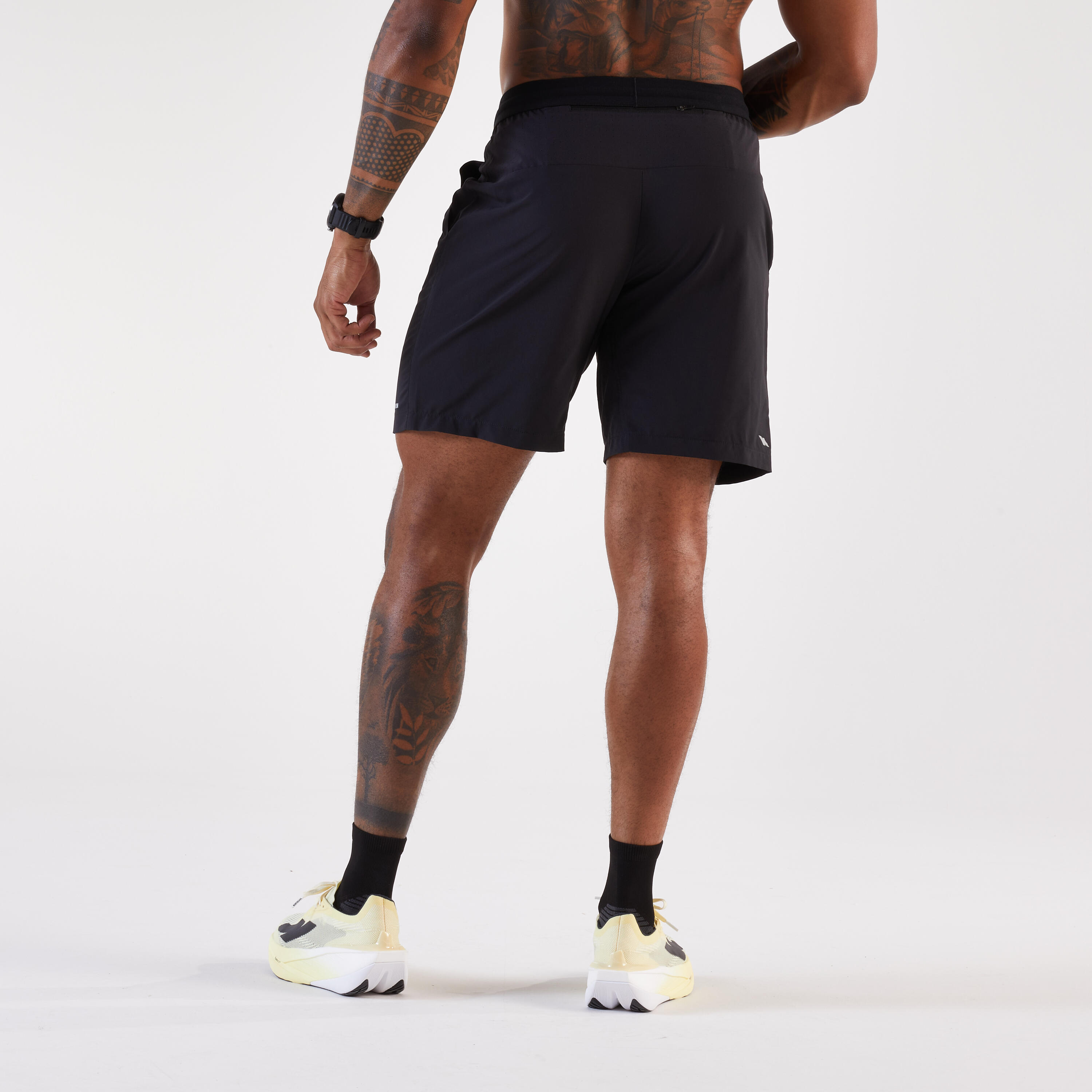 Pantaloncini running uomo DRY+ neri 5/8