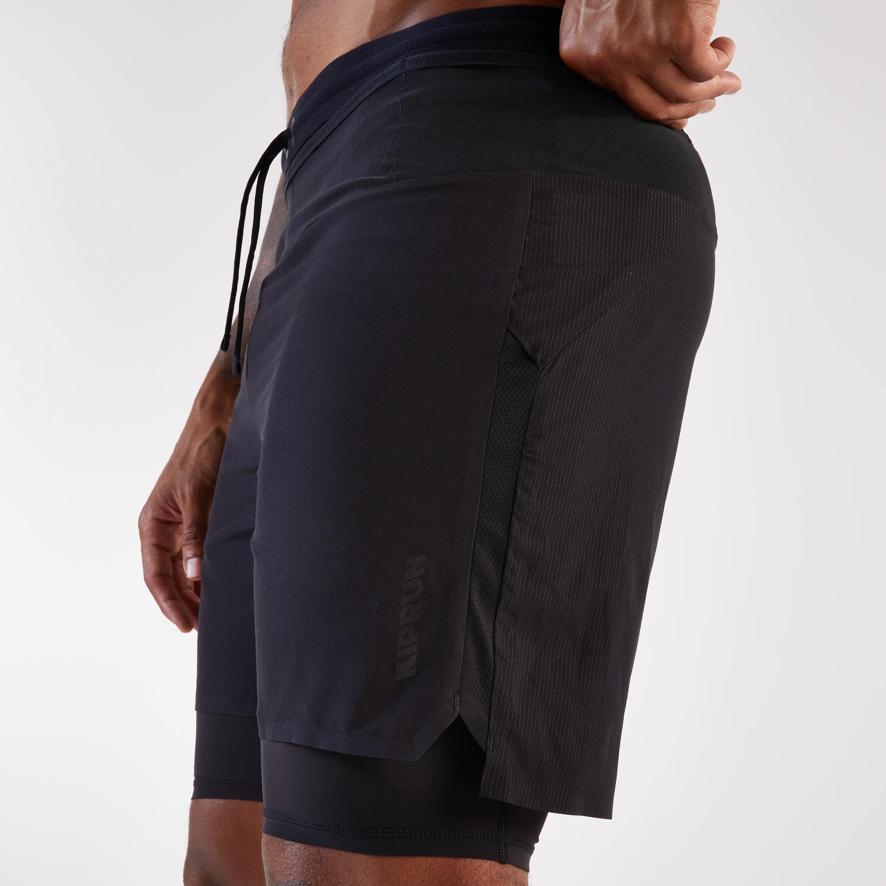 Pantalón corto 2en1 Running Trail larga distancia H, KIPRUN Run Ultra 900 negro 10/13